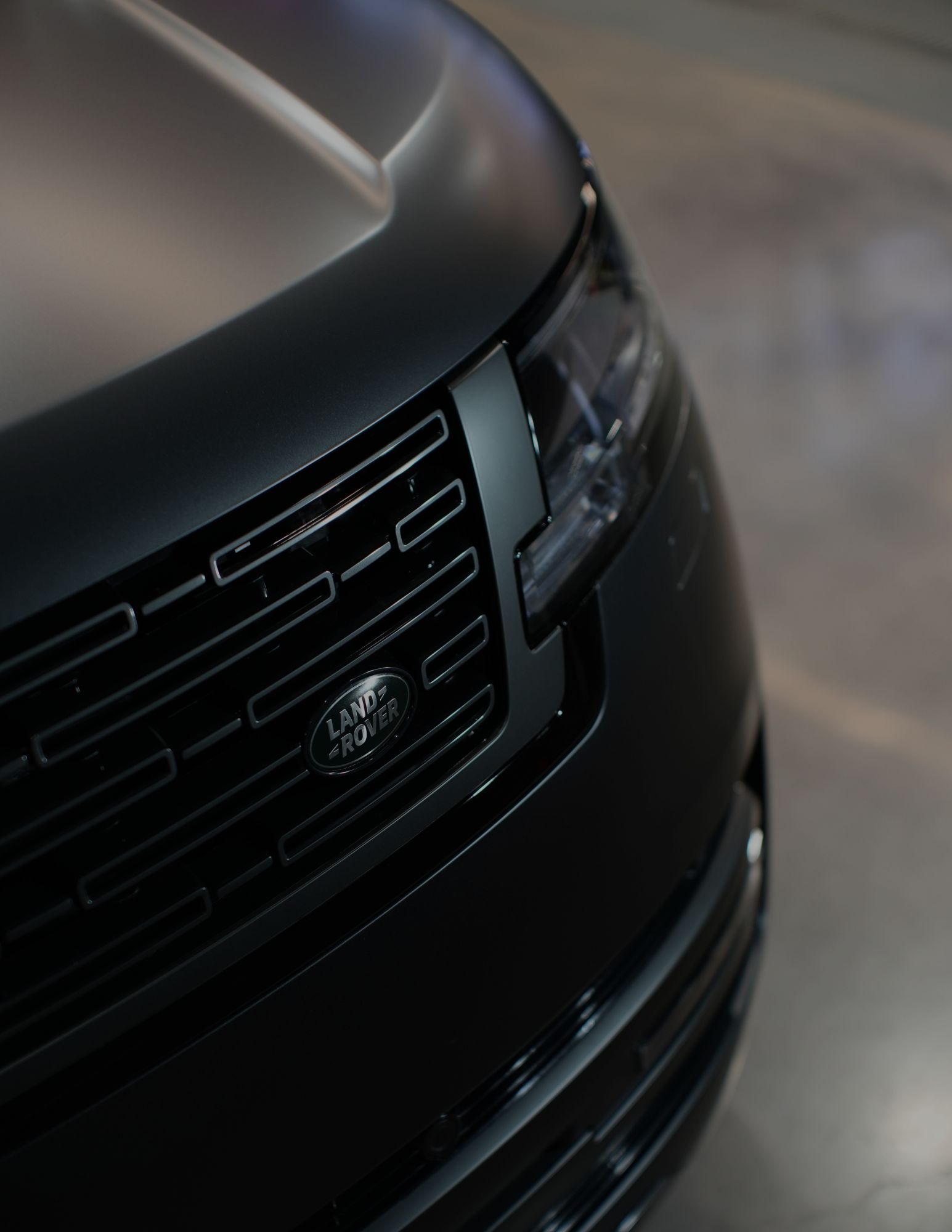 A side-by-side comparison showing a vehicle before and after the application of matte paint protection film.