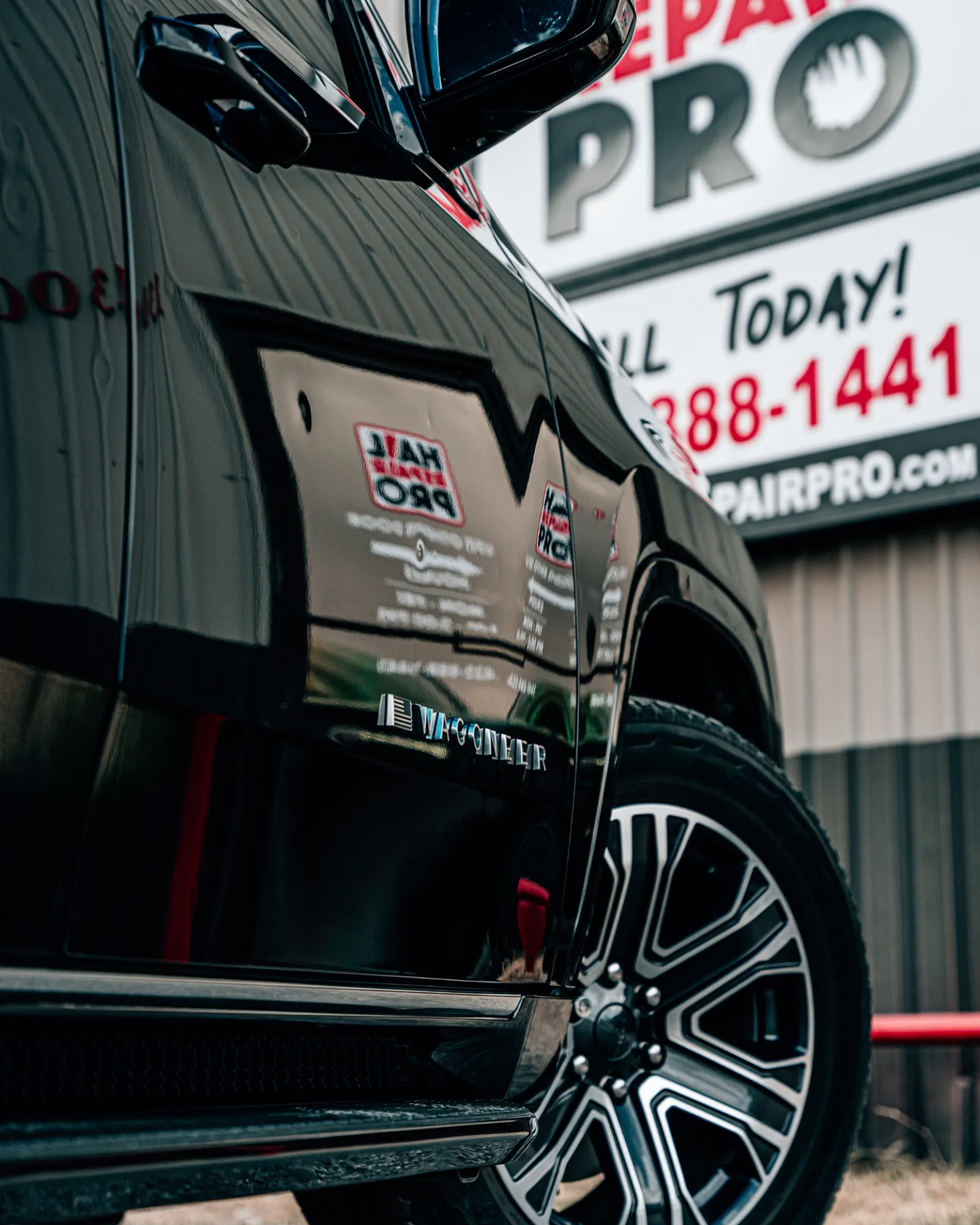 Jeep Wagoneer in for hail damage repair at Hail Repair Pro Lubbock TX shop on 43rd Street